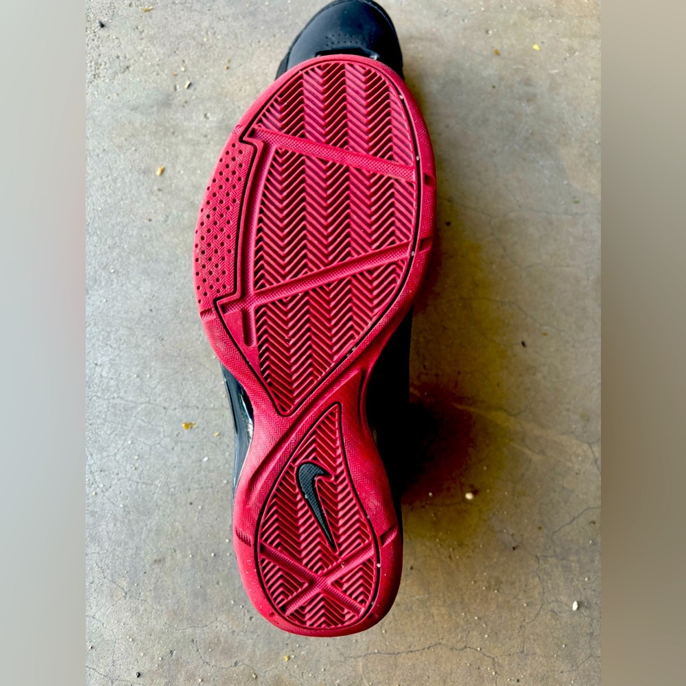 Black and red Nikes. Size 9.5